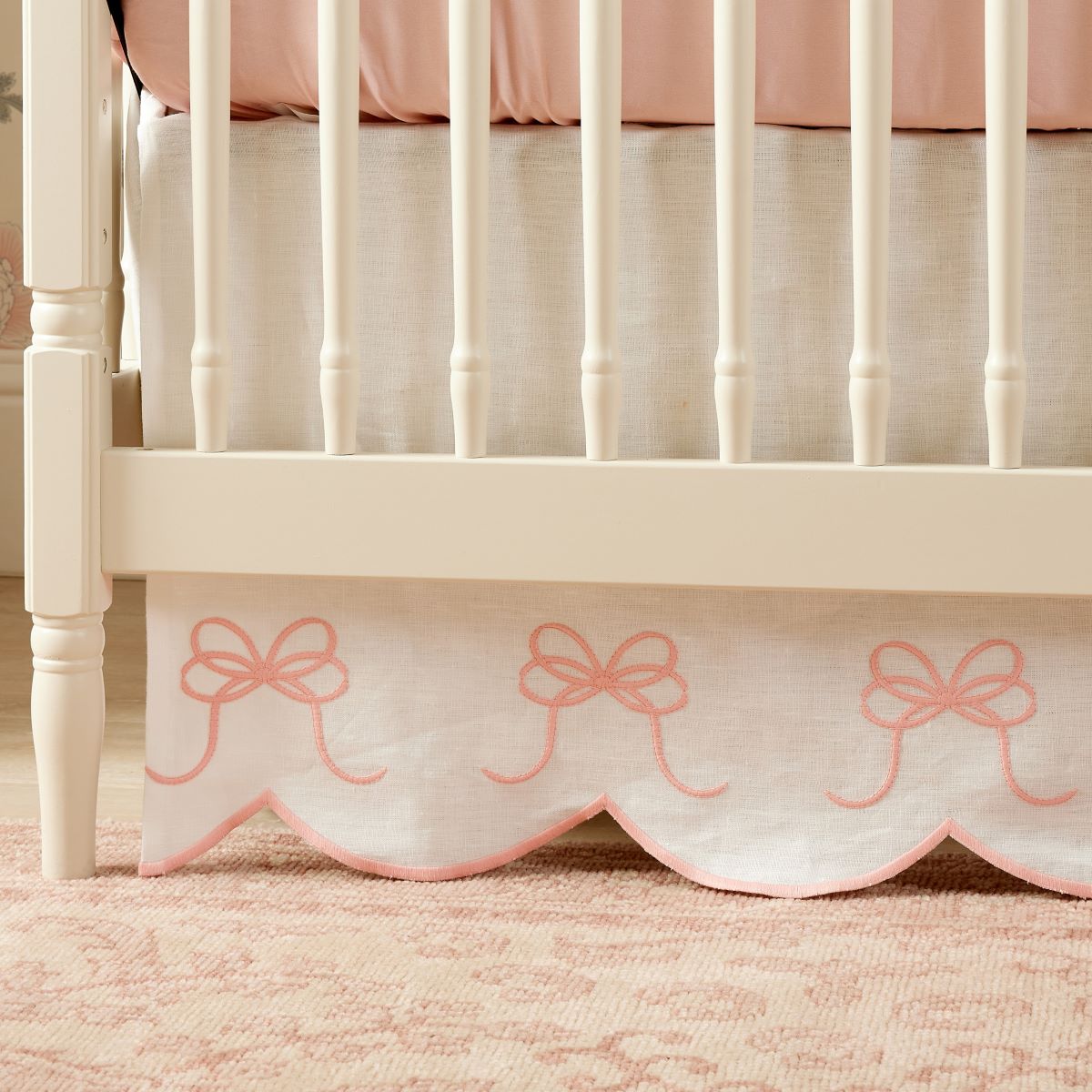 Bow Scalloped Crib Skirt in Petal Pink - Caitlin Wilson Design