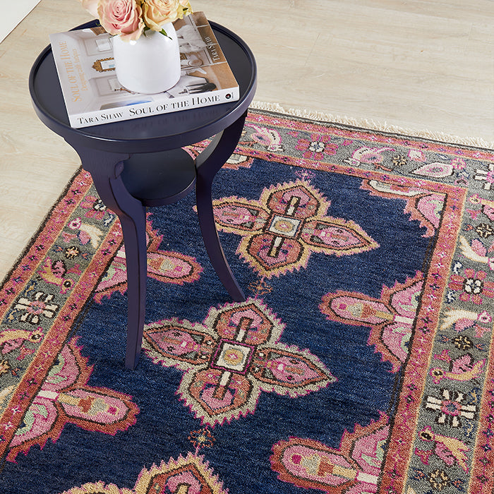 Kismet Living Room Area Rug in Navy Styled with Side Table