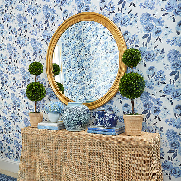 Nora Round Mirror in Gold on Floral Wallpaper
