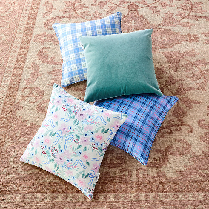 Porcelain Plaid in Silk Throw Pillow with Coordinating Pillows on Rug