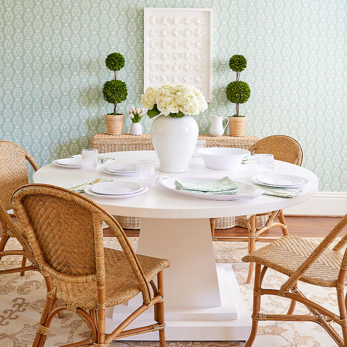 The Linley Rattan Dining Chairs in Dining Room
