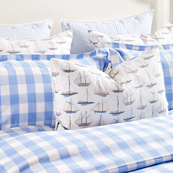 Sailing Throw Pillows on Bed