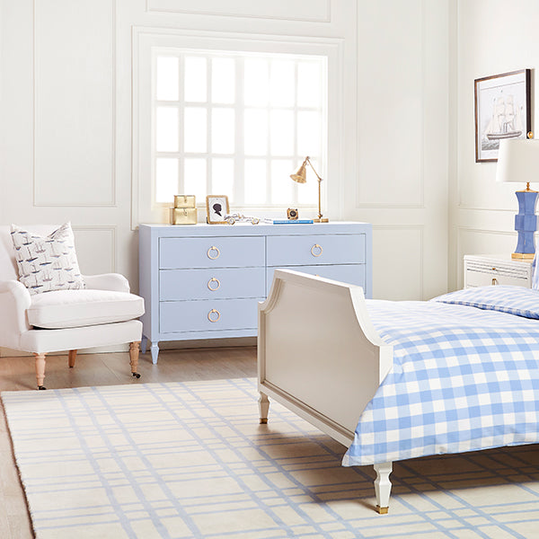 French Blue Tufted Livingston Checkered Area Rug in Bedroom