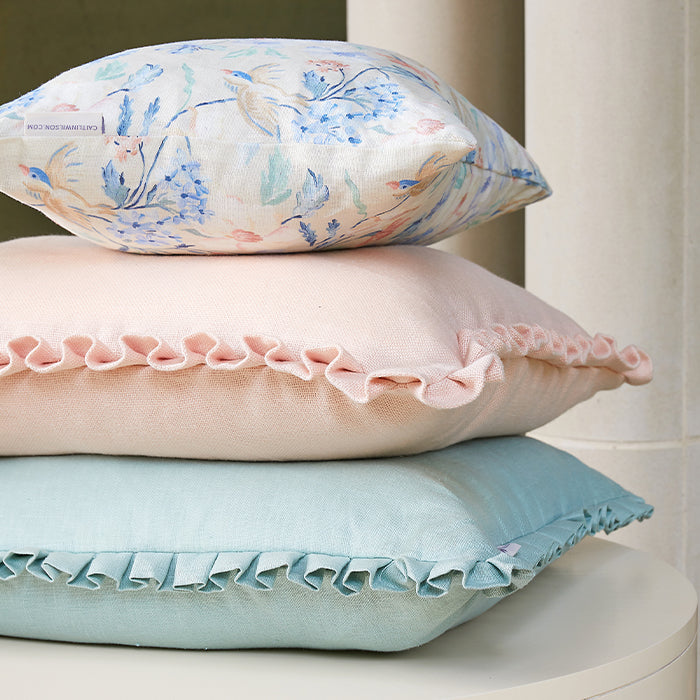 Stack of Box Pleat Throw Pillows in Sage and Peach