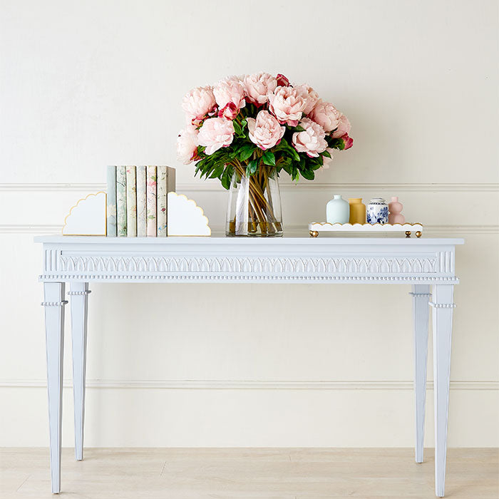 White Cece Scalloped Bookends on Console Table