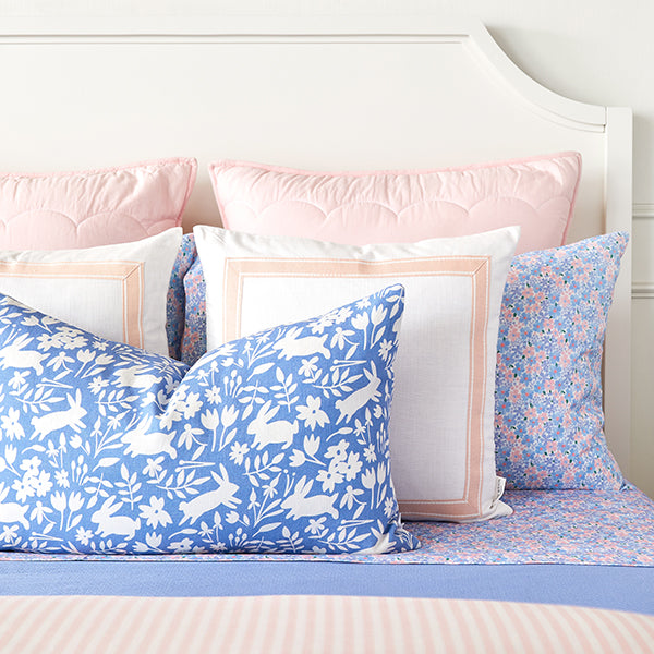 Blush Pink Scallop Pillow Shams on Bed