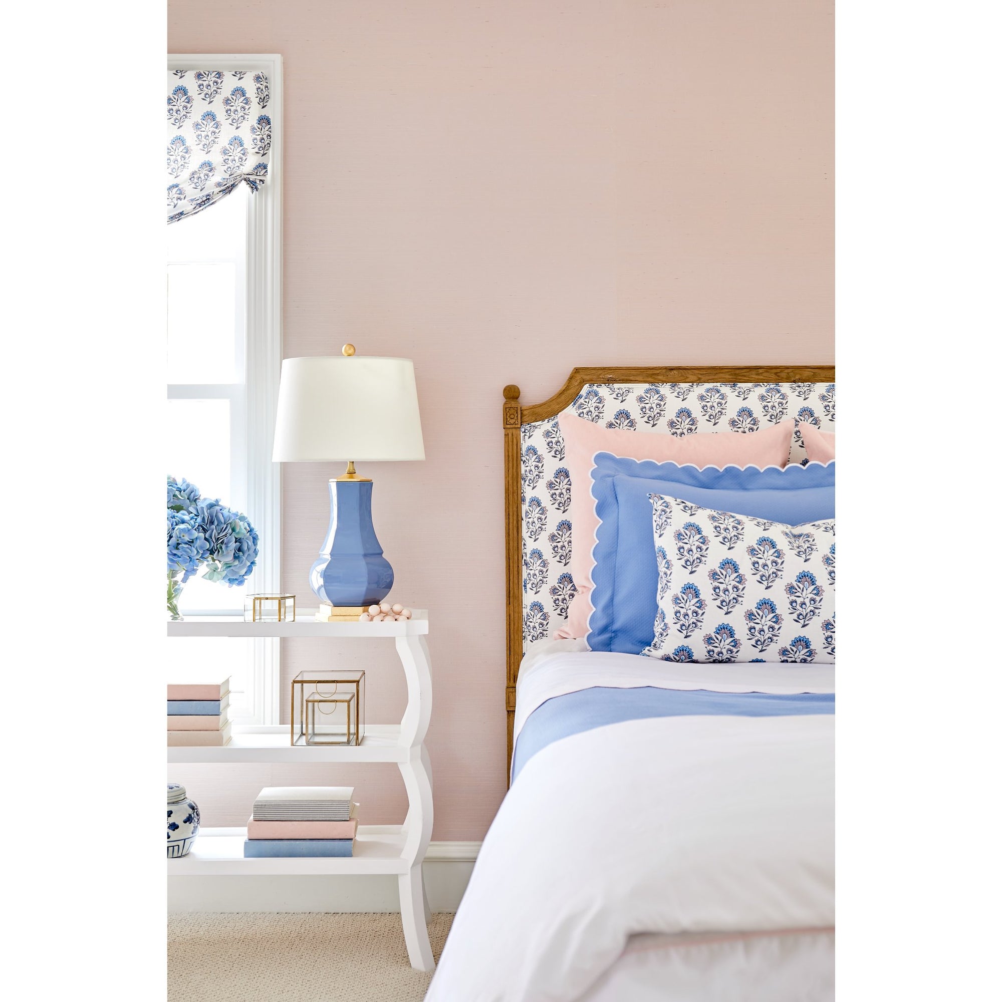 Grasscloth Wallpaper in Pale Rose on Wall Behind Bed