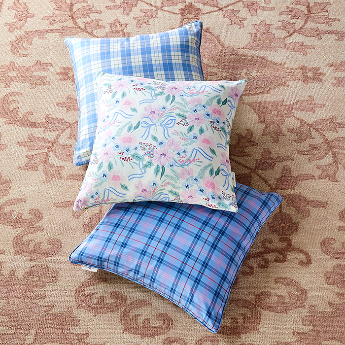 Porcelain Geometric Plaid in Silk Throw Pillow with Coordinating Pillows on Rug