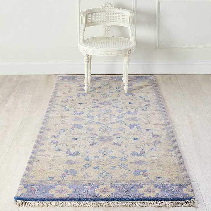 Lucy Wool Area Rug in Lilac Cream in a Room