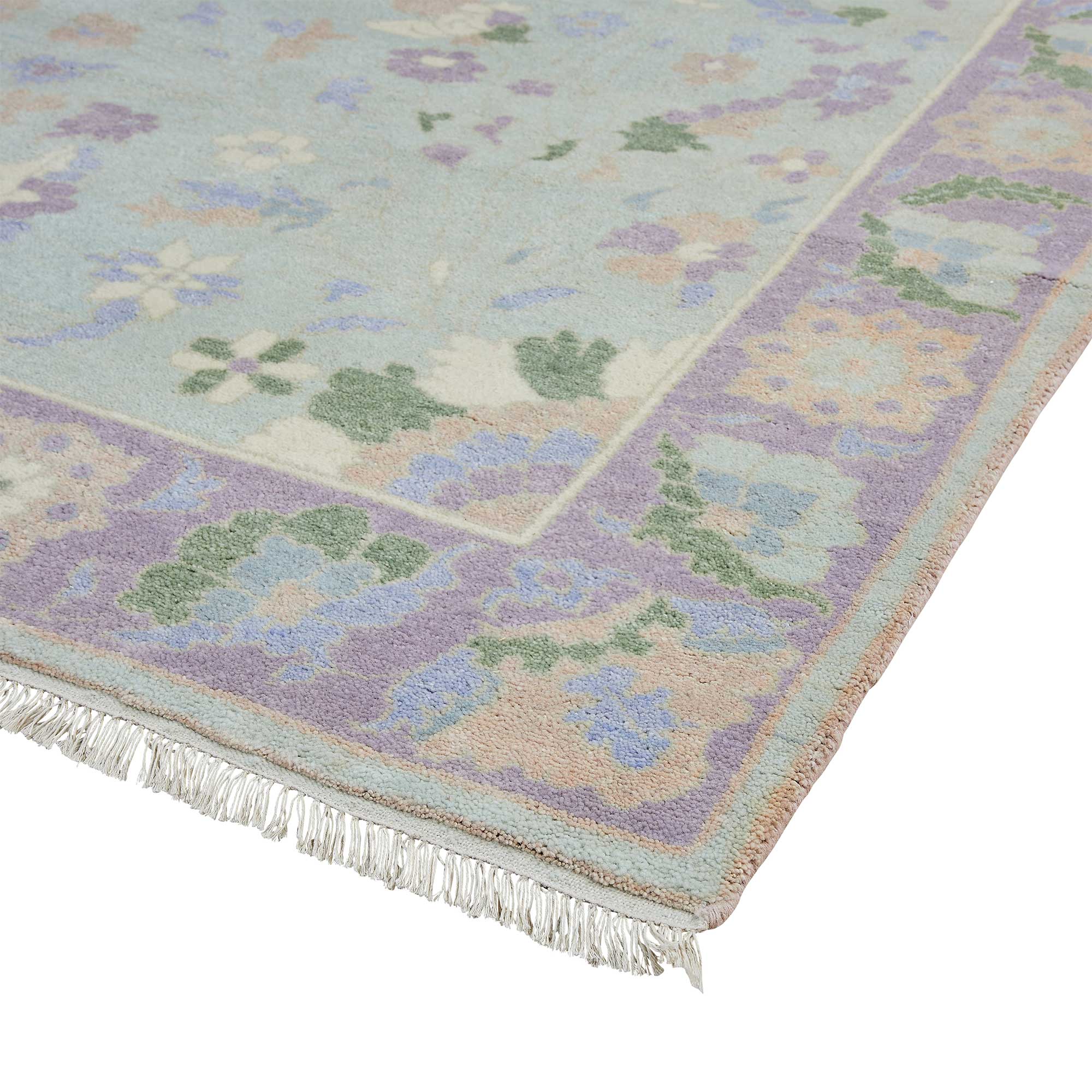 Corner of Olivia Rug in Lilac Sage