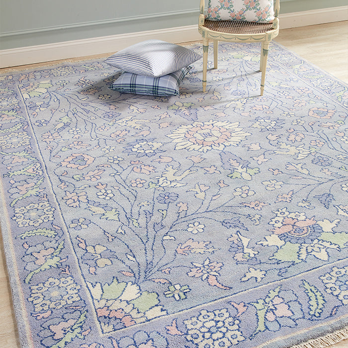 Olivia in Blue Pearl Floral Area Rug in Room with Coordinating Pillows