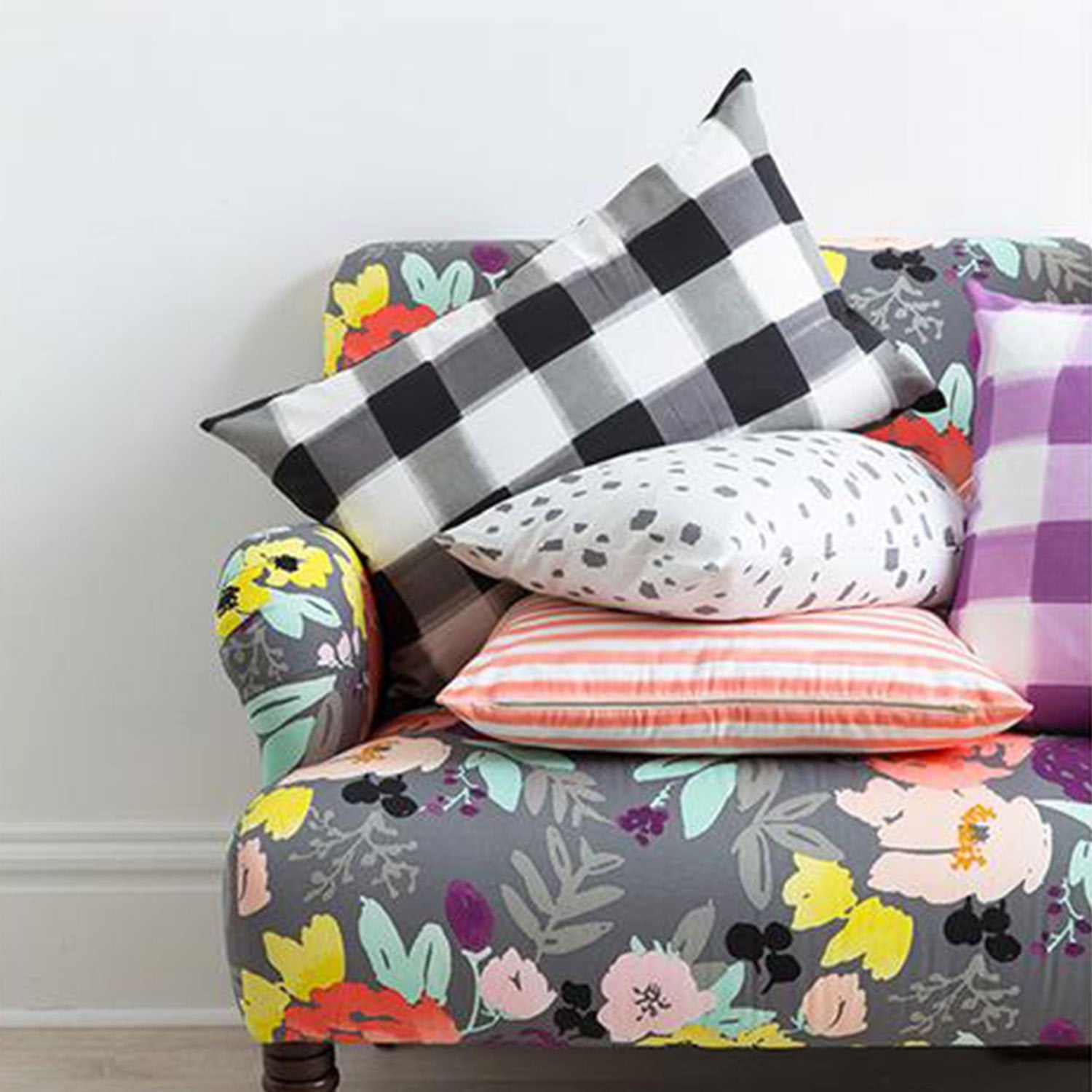 Burnside Buffalo Checked Pillows on Floral Couch