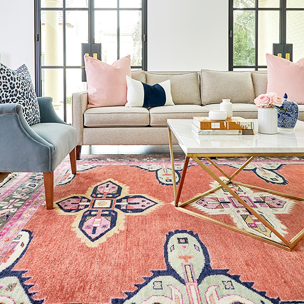 Living Room with Kismet Geometric Area Rug in Coral