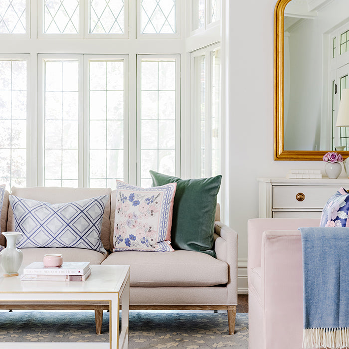 Maria Throw Pillow in Blue and Pink Floral in Living Room
