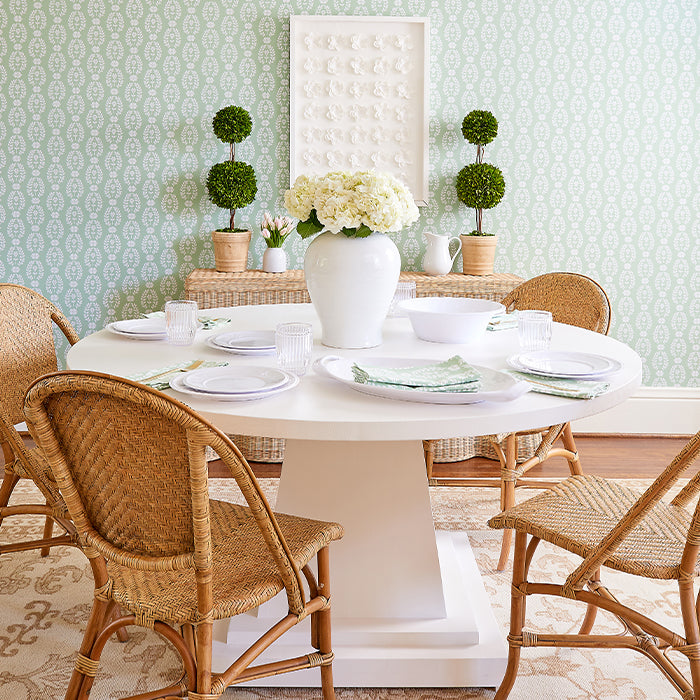 Large Boxwood Topiaries Styled in Dining Room