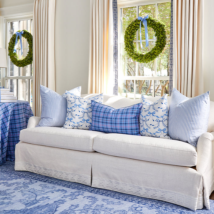 Living Room with Ivory Sofa and Blue and White Pillows